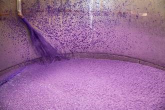 Paper pulp and water is mixed together in large vats.