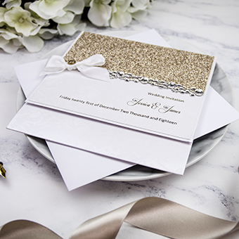 Beautiful handmade wedding invitations with glitter by Mandy price of Elegant Creations.