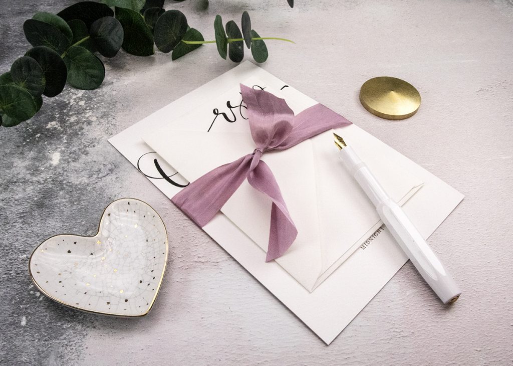 Simple Elegant wedding invitations with silk ribbon.