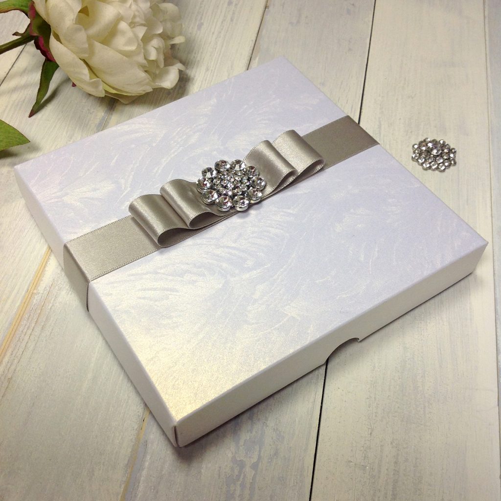 Invitation boxes can be decorated themselves.