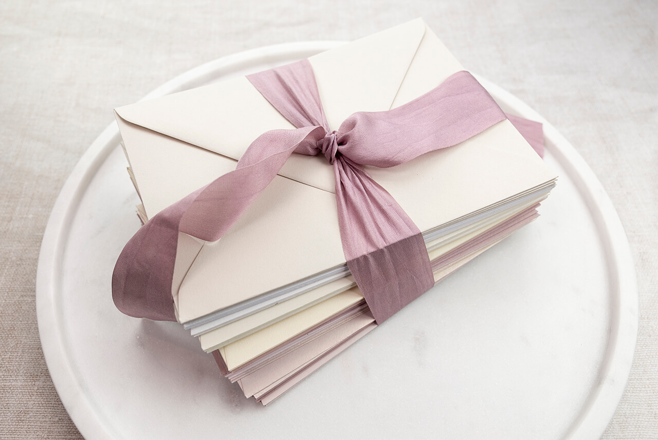Stack of luxury wedding envelopes
